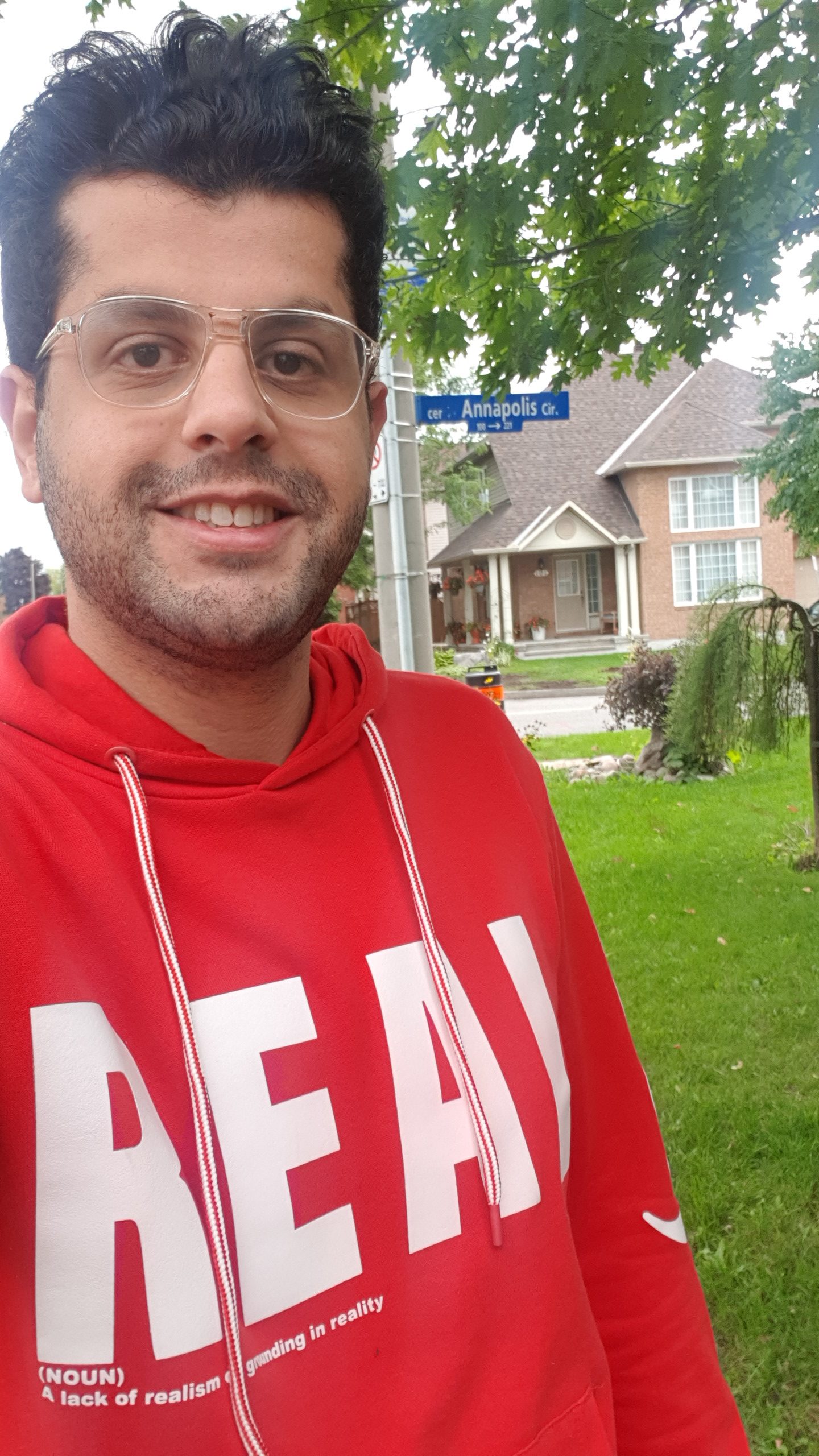 A professional portrait of Ahmed Hamed